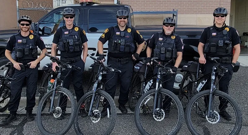 Prescott police officers and bikes.