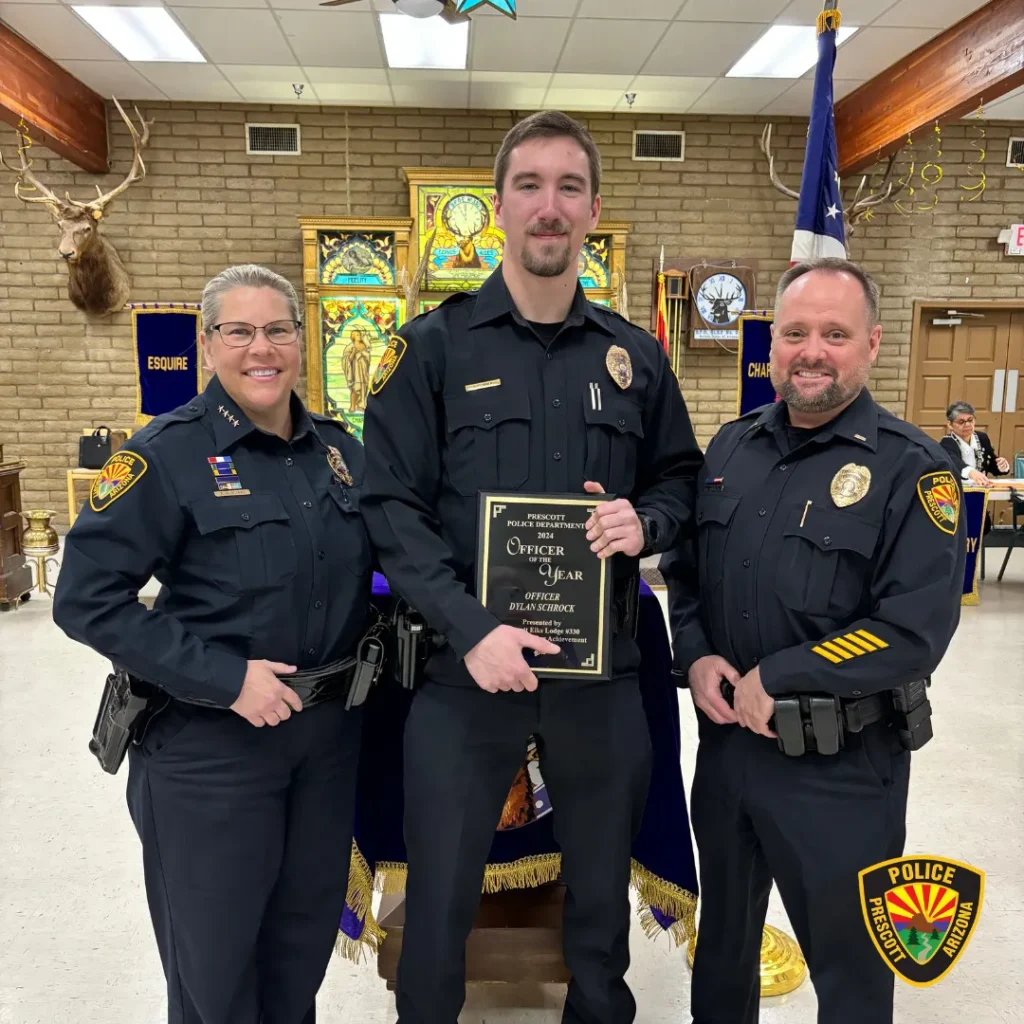 Officer of the Year plaque and officers.